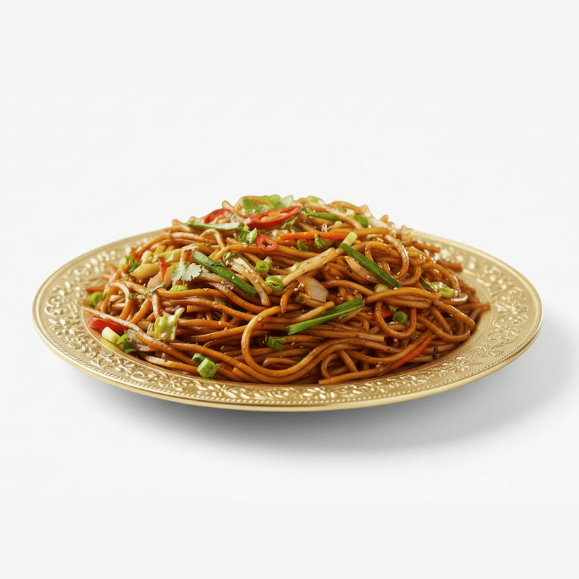 Plated dish of noodles with vegetables on a white background